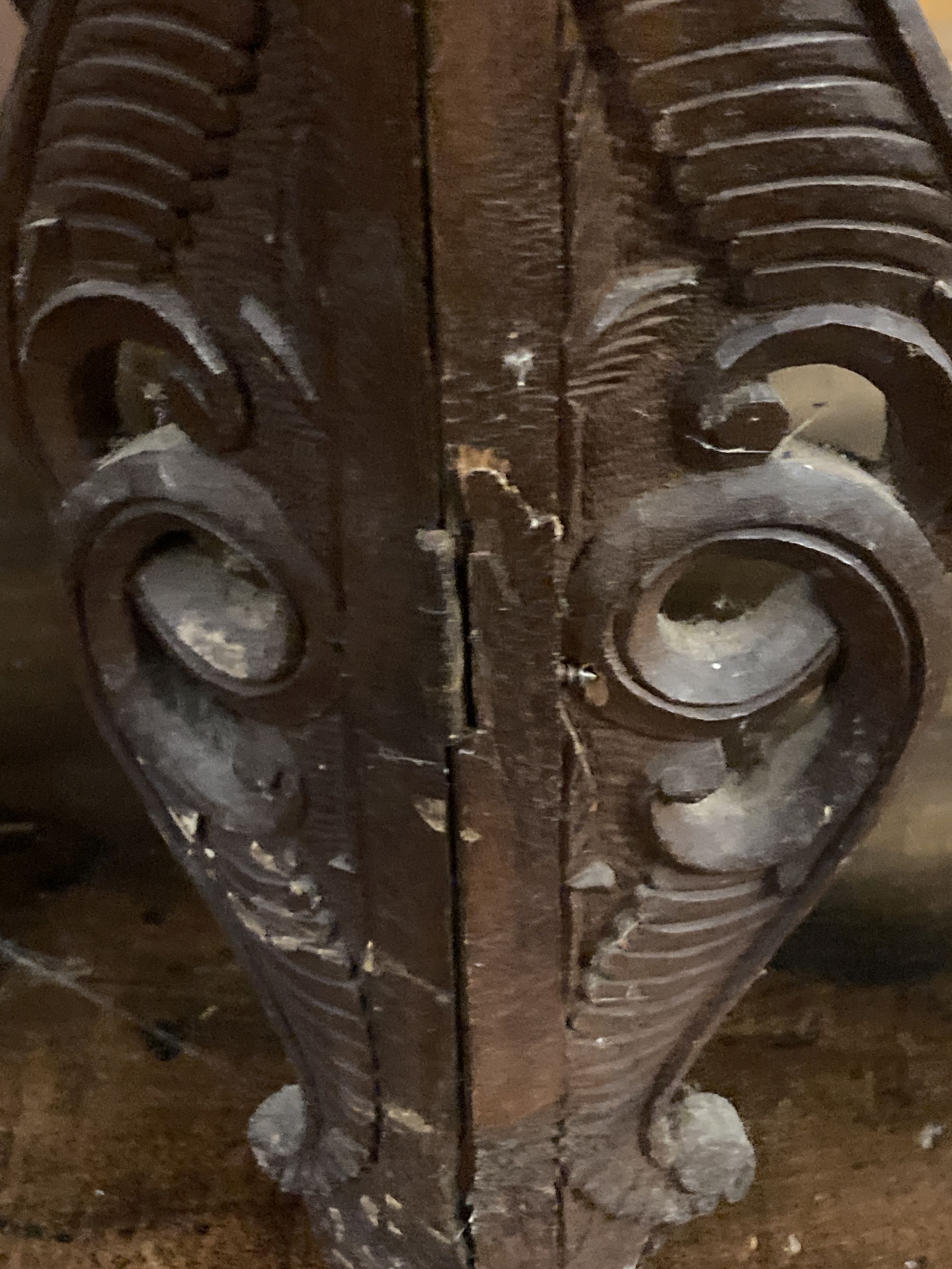 An Indian carved hardwood coffee table on a folding stand, width 63cm height 60cm